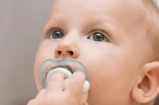 will a baby spit out pacifier if hungry
