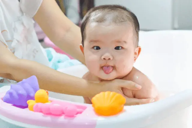How to keep Baby from Standing up in Tub