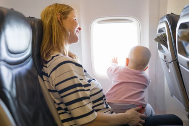 Can a 2-month-old baby travel on a plane