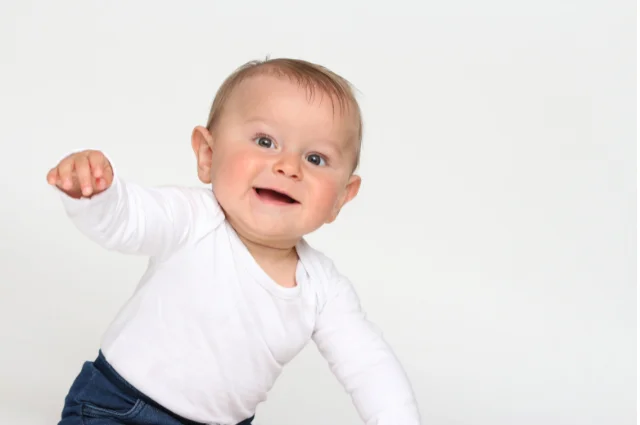 Is it normal for baby to flap arms at 8 months old?
