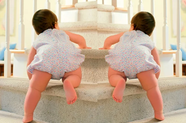 When do babies climb stairs?