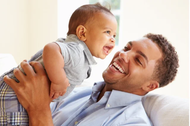 When do babies recognize their father?