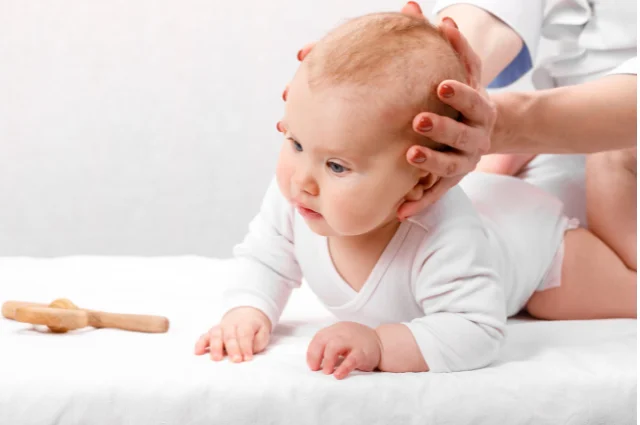 Is baby shaking head side to side a sign of teething?